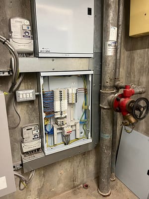 Electrician on a commercial site restoring power