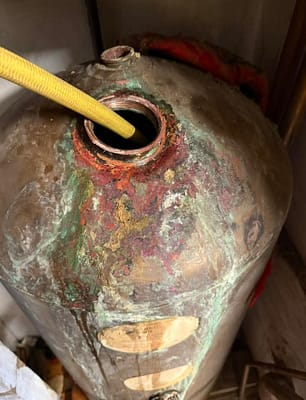 Emergency plumber checking water leak in St Albans property