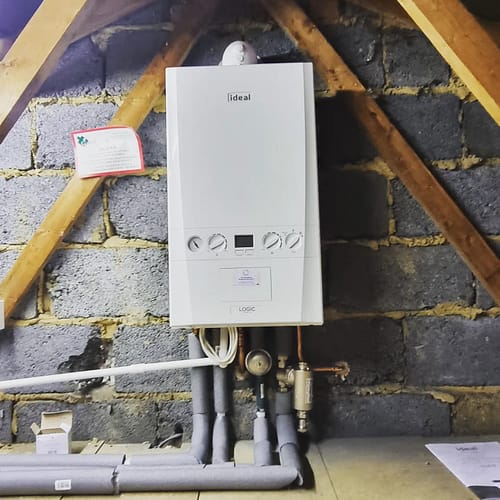 Emergency Plumber Milton Keynes Local plumber installing new boiler in Milton Keynes property